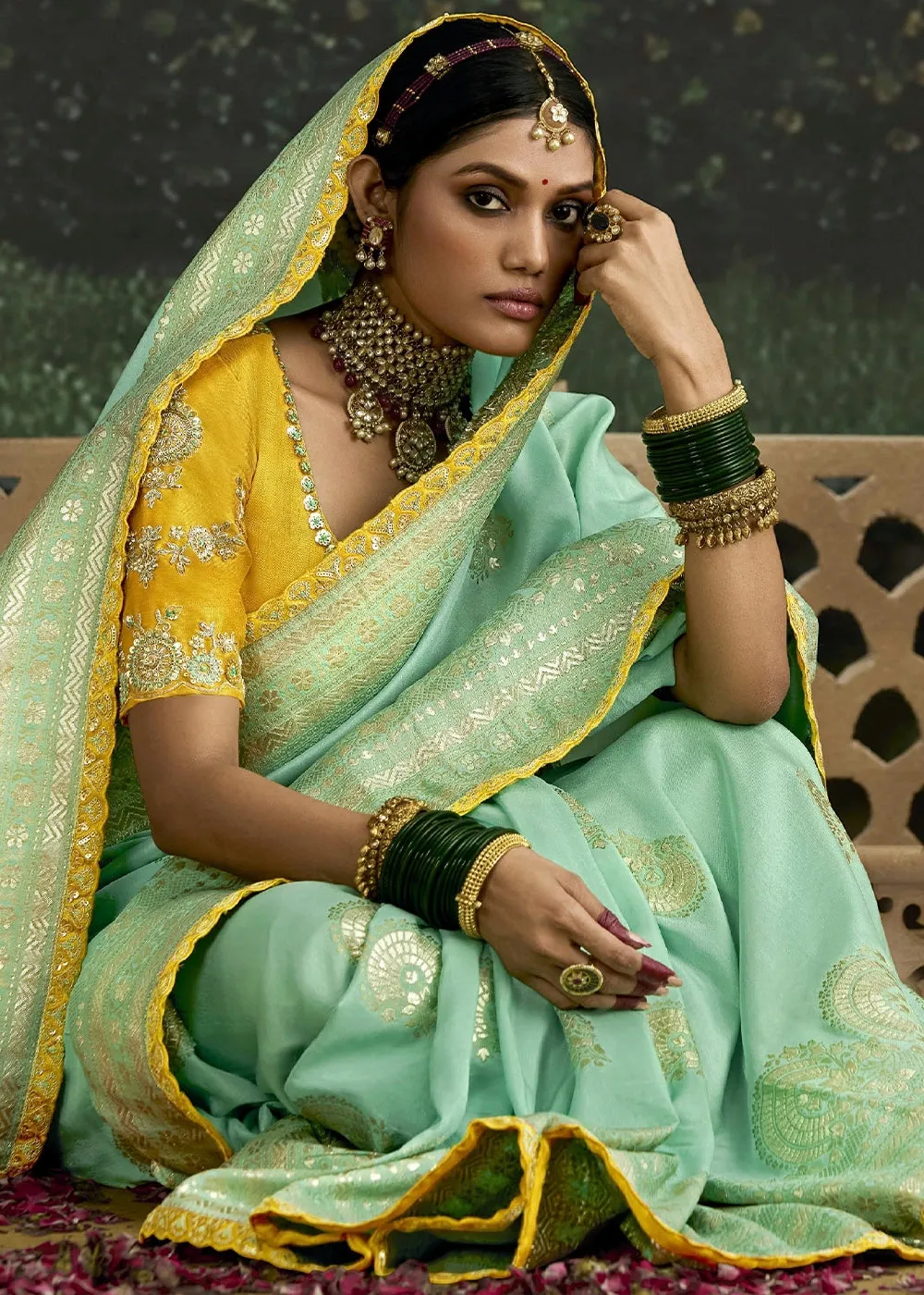 Aquamarine Blue Zari Woven Dola Silk Saree with Embroidery Detailing