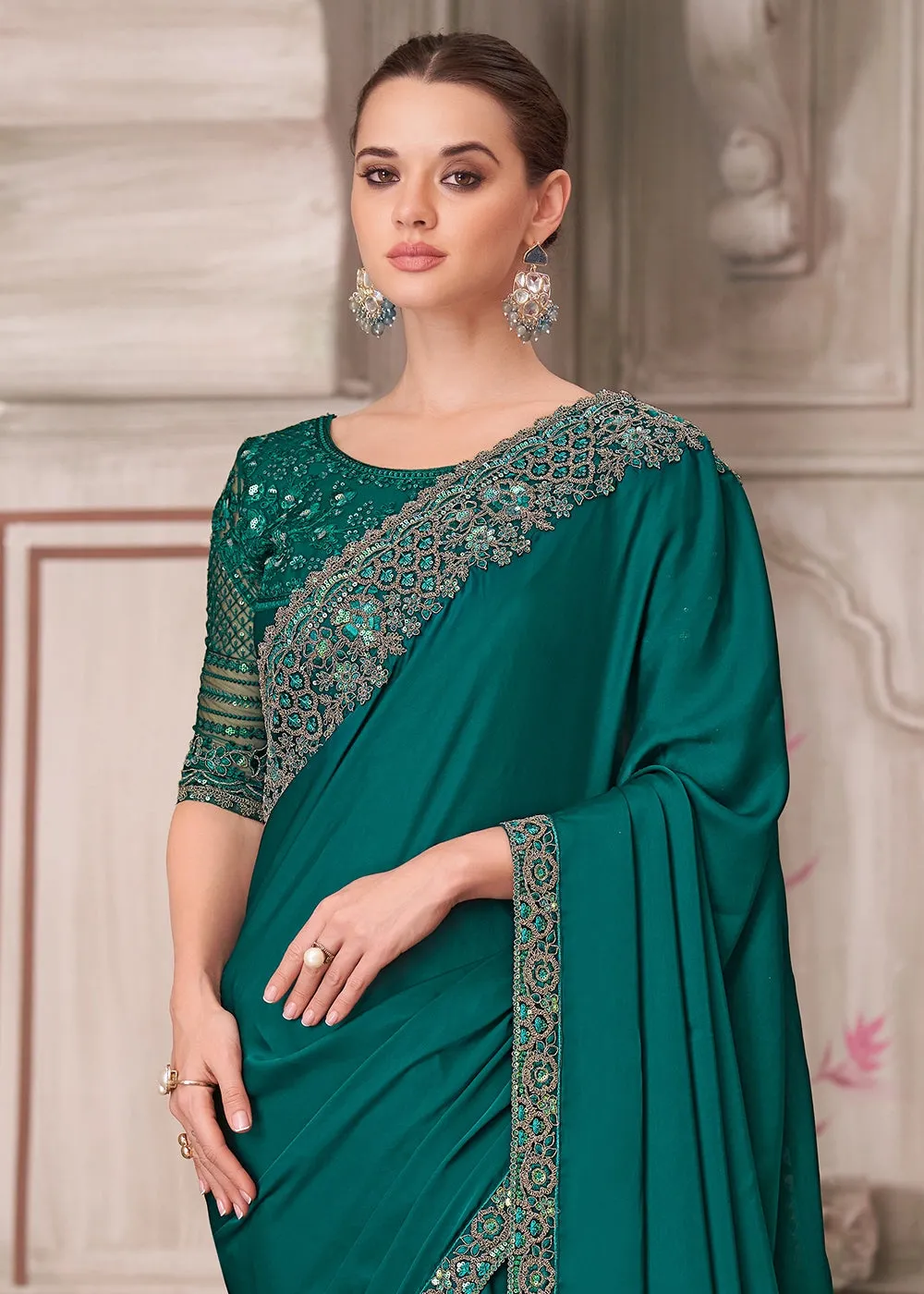 Arabian Green Satin Silk Saree With Detailed Embroidery And Luxe Appeal