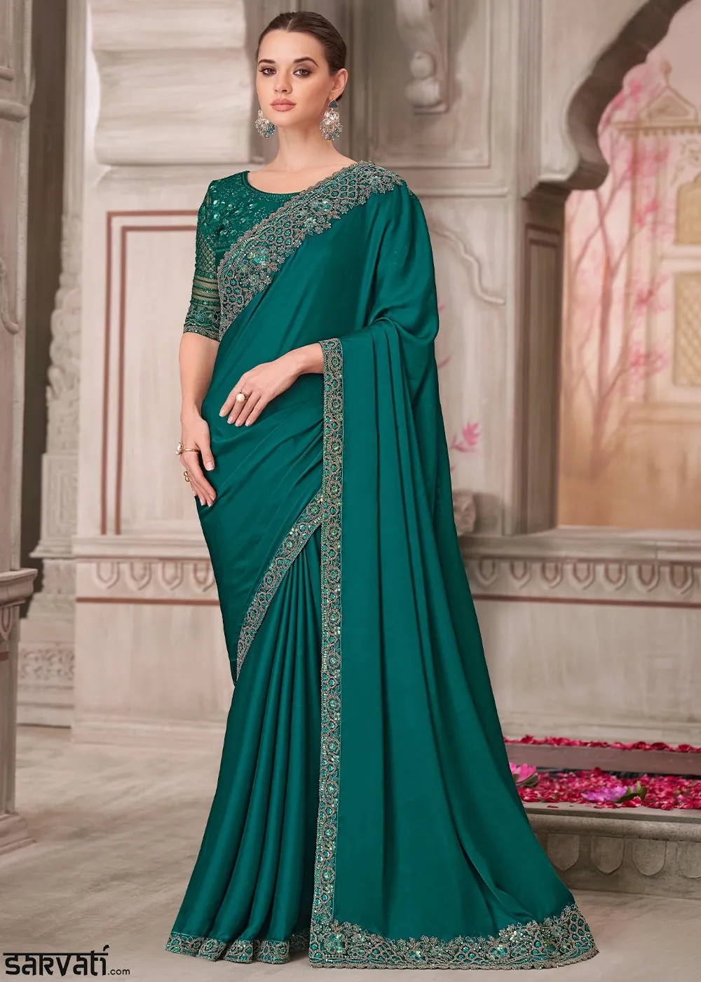 Arabian Green Satin Silk Saree With Detailed Embroidery And Luxe Appeal