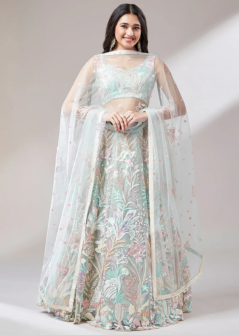 Blueish Green Net Lehenga Choli Adorned with Sequins work