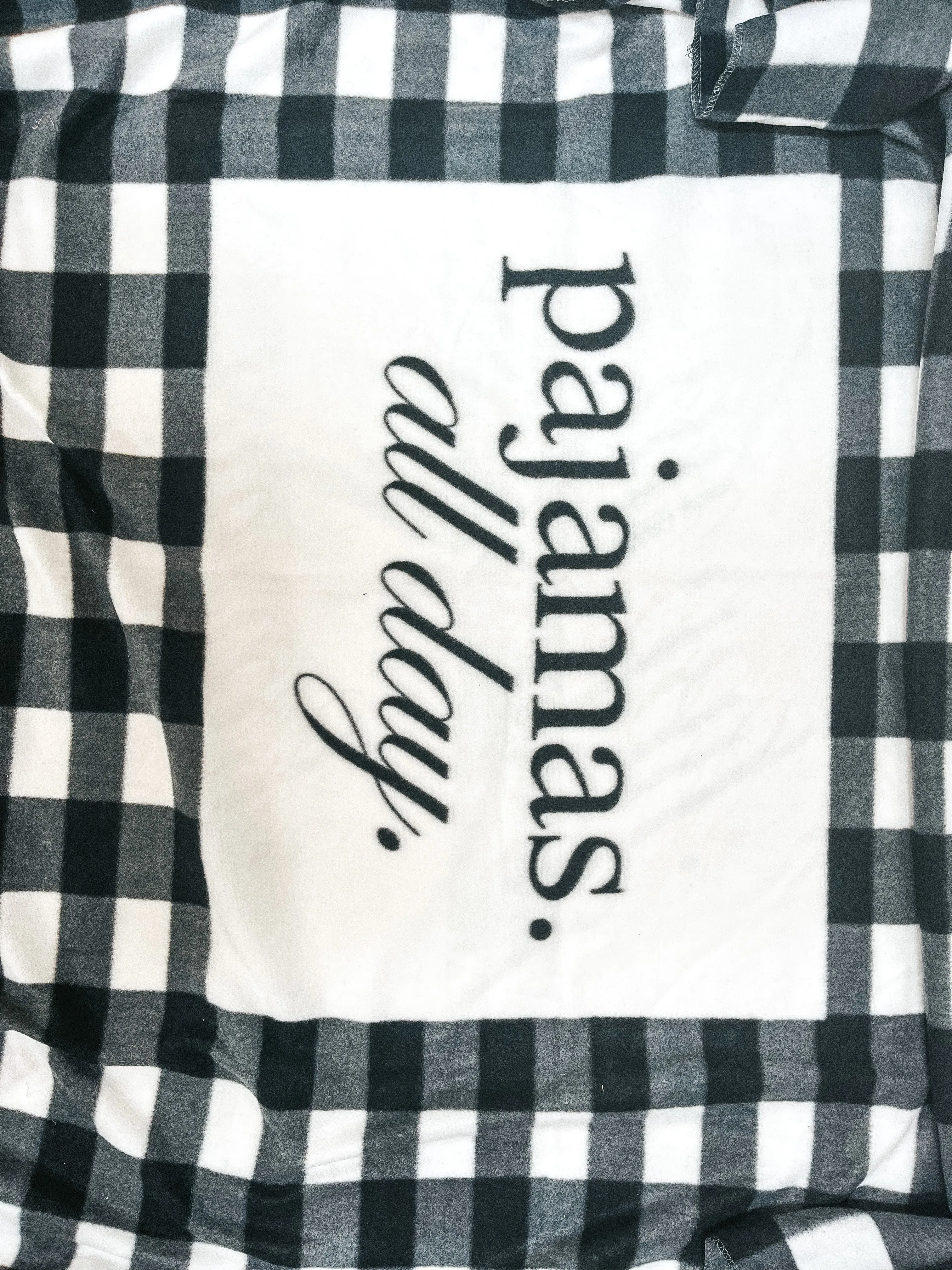Pajamas All Day Buffalo Plaid Throw Blanket in Black and White