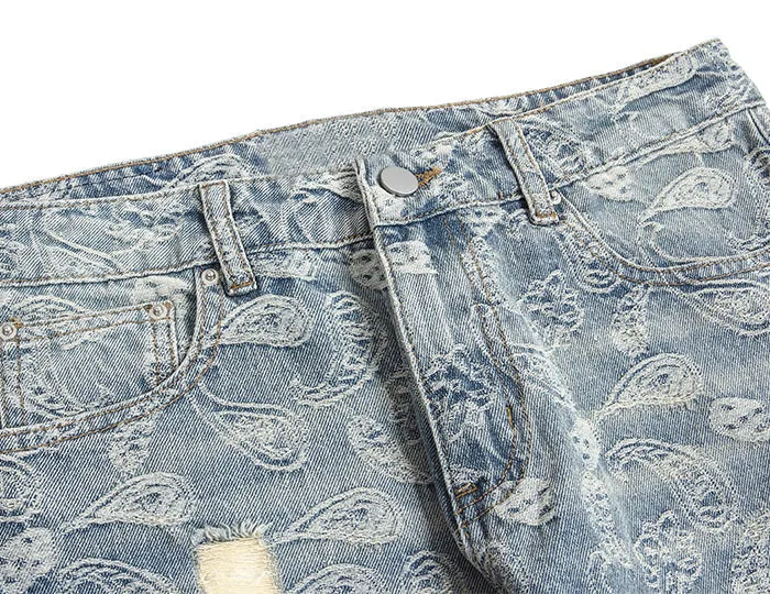 Ripped Denim Jeans with Ankle Zip and Paisley Pattern Embroidery