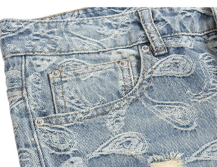 Ripped Denim Jeans with Ankle Zip and Paisley Pattern Embroidery